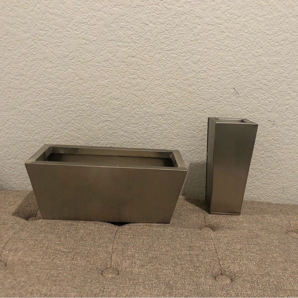 Candle and vase or holds floral